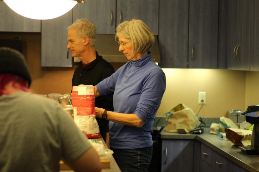 Madeline Golderg, '20, John LoGiudice and Professor Kathleen LoGiudice making pie in Messa. Photo by Kwesi Blankson.