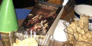 Snacks and books at Charles Dickens’ 207th birthday party. Photo by Zineb Hajjaj.