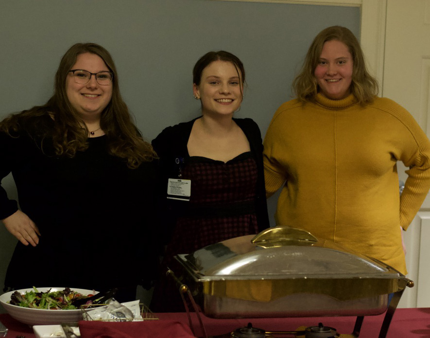 (From left to right) Emily Ehrlich ’19, Jacquelynne Burmester ’20 and Nicole Derosier ’20 at the event. Photo by Zineb Hajjaj.