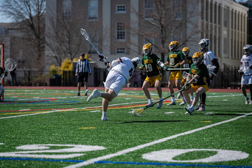 Midfielder Brian Davis ’22 takes a shot against Clarkson