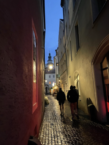 The cramped walls in the alleys of Regensburg are made even more cramped by their age, as they bow into the streets.