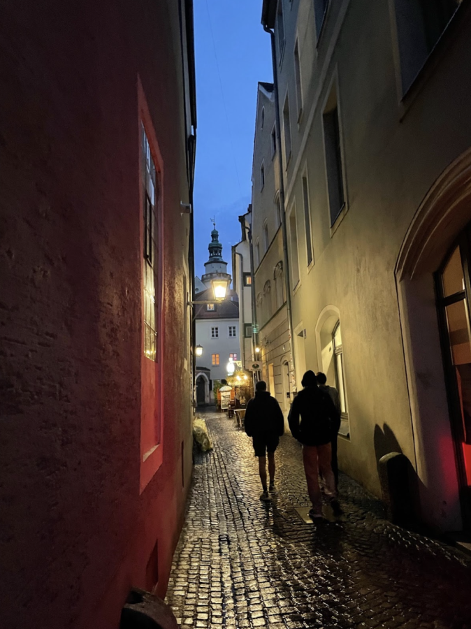 The+cramped+walls+in+the+alleys+of+Regensburg+are+made+even+more+cramped+by+their+age%2C+as+they+bow+into+the+streets.