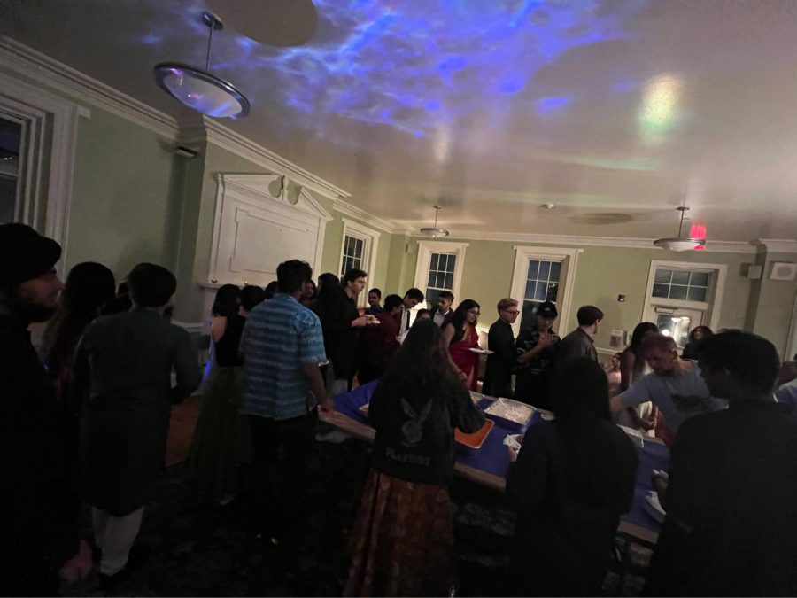 Students wear kurtas and kurtis, traditional dress for Diwali, and dance in Old Chapel to Bollywood music.