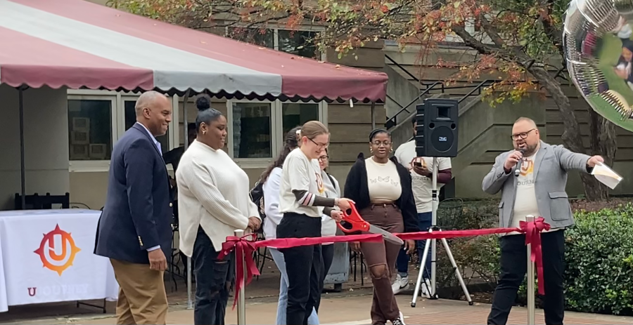Student leaders inaugurate the new curriculum by cutting a ribbon with President Harris (far left) and Dean Keytack (far right) after speeches given by the President and Dean to introduce to plan. 
