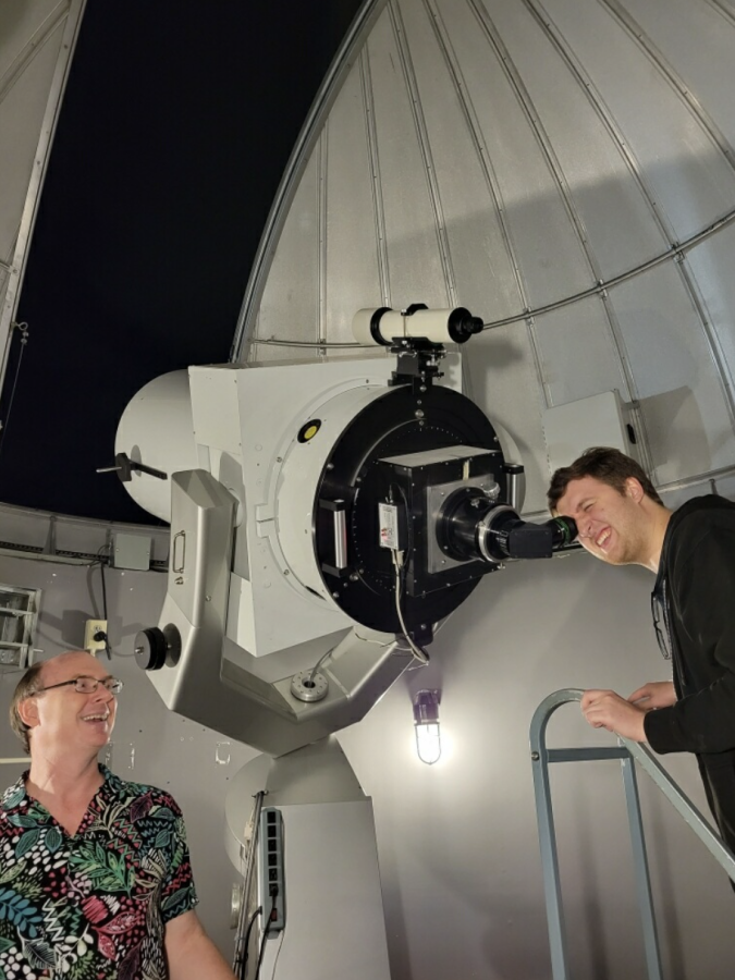 Professor Francis Wilkin, the Astronomy Observatory Manager, and a student observing the Saturn. 
