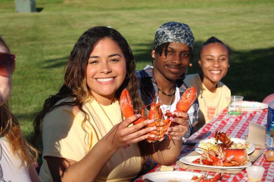 Students eating lobster. 