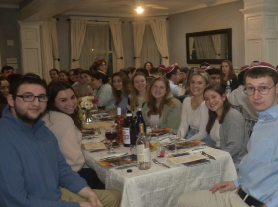 Union students enjoying a festive Passover Seder at Chabad.