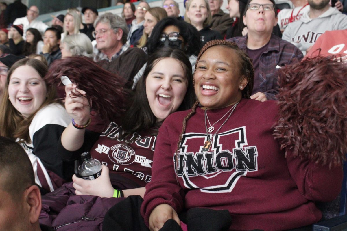 Students Cheering on the Garnet Chargers at the game. 