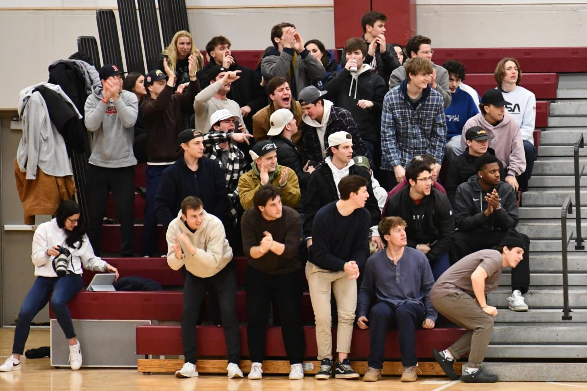 The crowd cheers on at the men’s basketball game.
