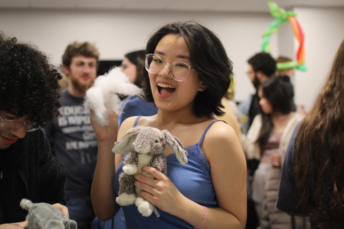 Alanna Byrne ’26 stuffs a bunny on the fourth floor of the campus center. Students were able to stuff various plushies throughout the night.