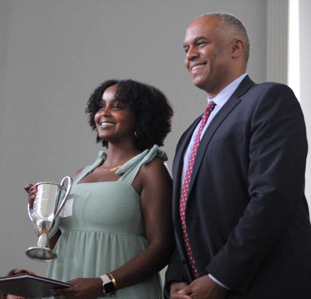 Ebyan Abshir ‘24 with President Harris accepting the Bailey prize. 