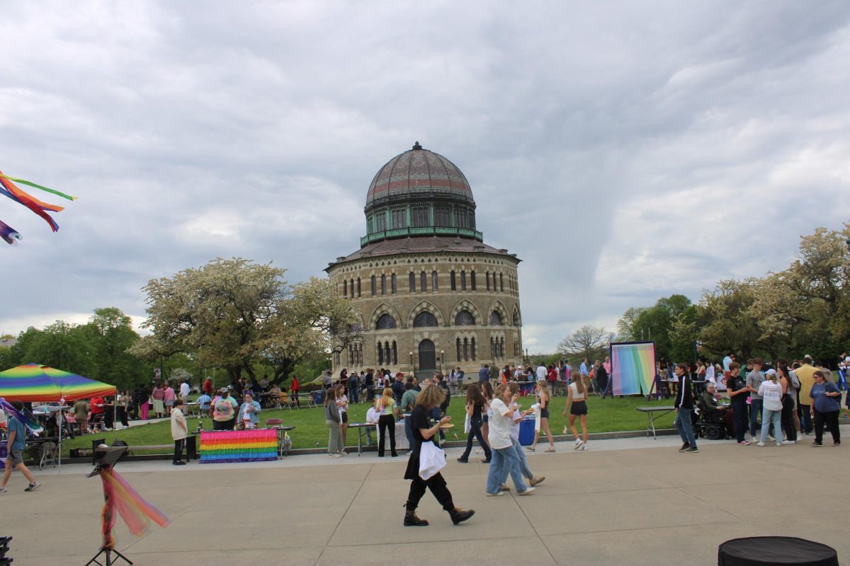 The Nott memorial during pridefest, with a variety of tables set up. 