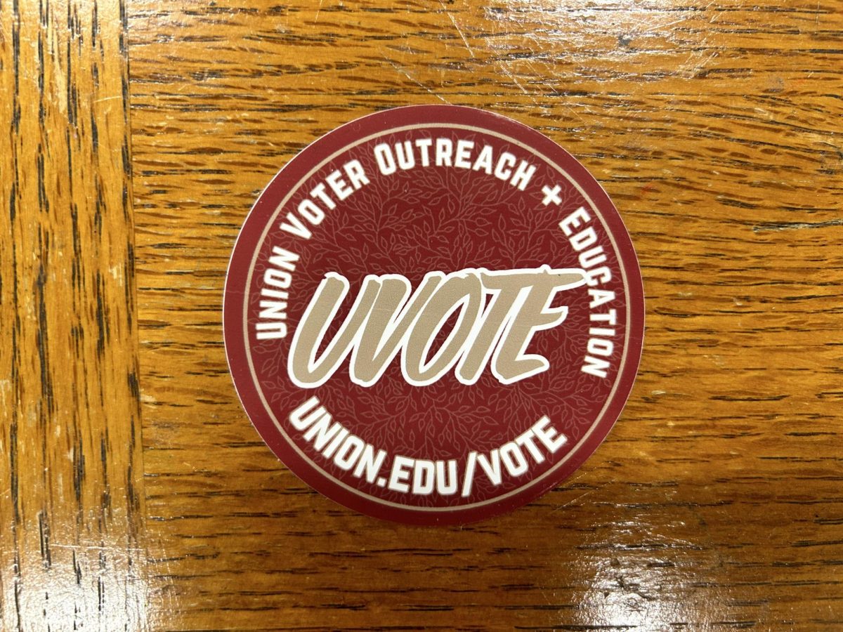 A UVOTE sticker, given to students who register to vote. 