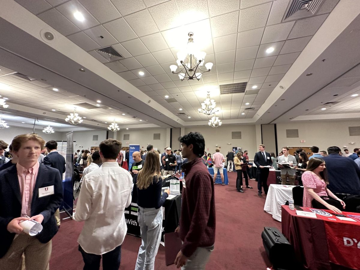 Students at the career fair exploring different tables. 