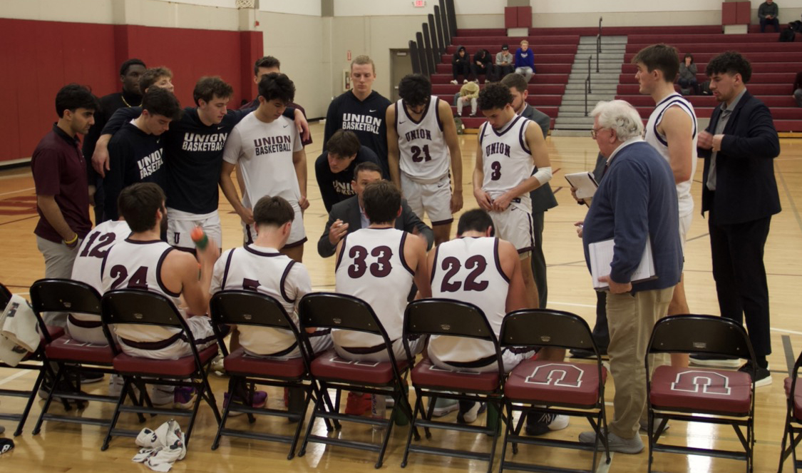 Union College’s Men’s Basketball team disscusses strategy at a time out during the game. In the end, their strategy and hardwork helped them to win the game against Bard.