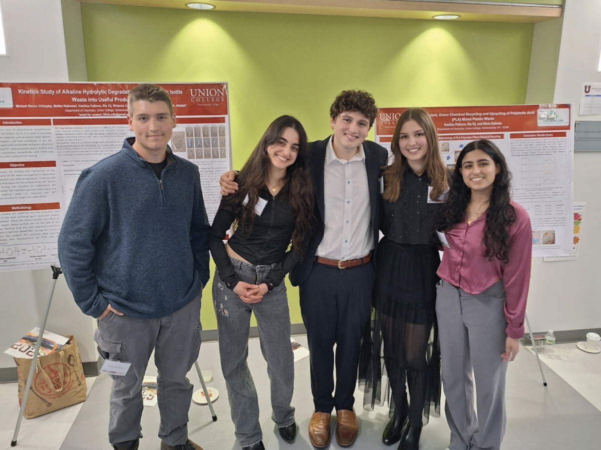 Michael Rocco O’Krepky ‘27, Melika Niakosari ‘27, Vasilisa Palkova ‘27, and Ria Vij ‘27 present their research on chemical recycling and upcycling of plastic waste. Their work focuses on developing sustainable chemical reactions for degrading PET plastic into its monomers using hydrolysis, followed by upcycling of those products, as well as determining the specific most effective reaction conditions.