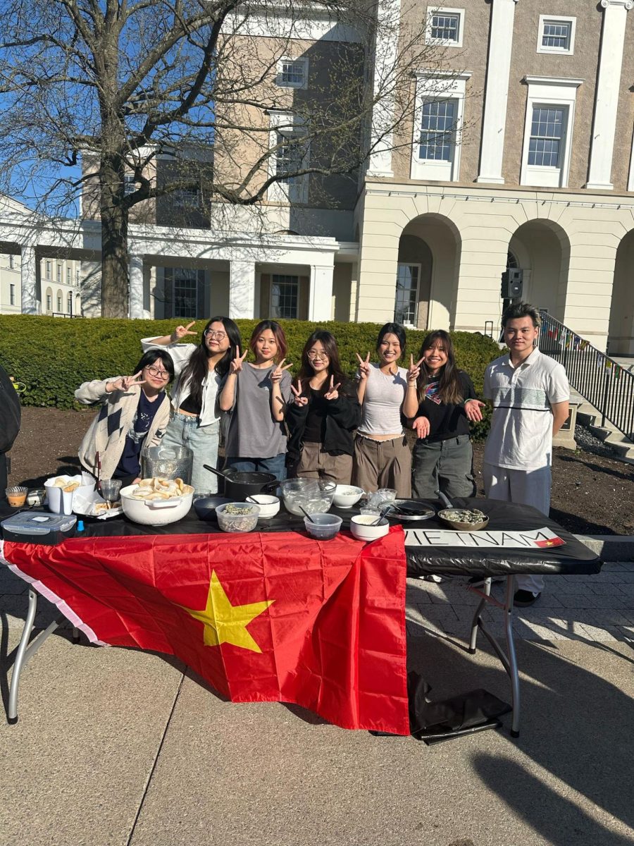 Students tabling for Vietnam pose for a photograph. 