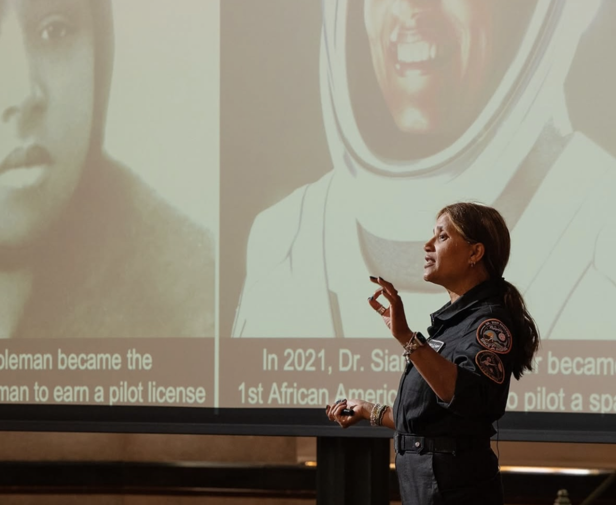 Dr. Sian Proctor delivers her keynote address "Earthlight: Exploring the Intersection of Art, Science, and Engineering for Earth and Beyond" in the Nott Memorial (courtesy of @unioncollege on Instagram)