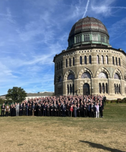 Kappa Alpha Society brothers from different chapters in front of Union's Nott Memorial. 