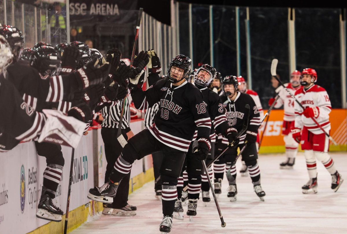 Ben Muthersbaugh '28 and his teammates celebrate after he scored a goal against Sacred Heart University. 