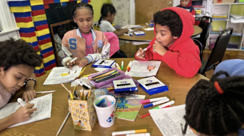 Coloring activities that the volunteers conduct with the COCOA House kids.