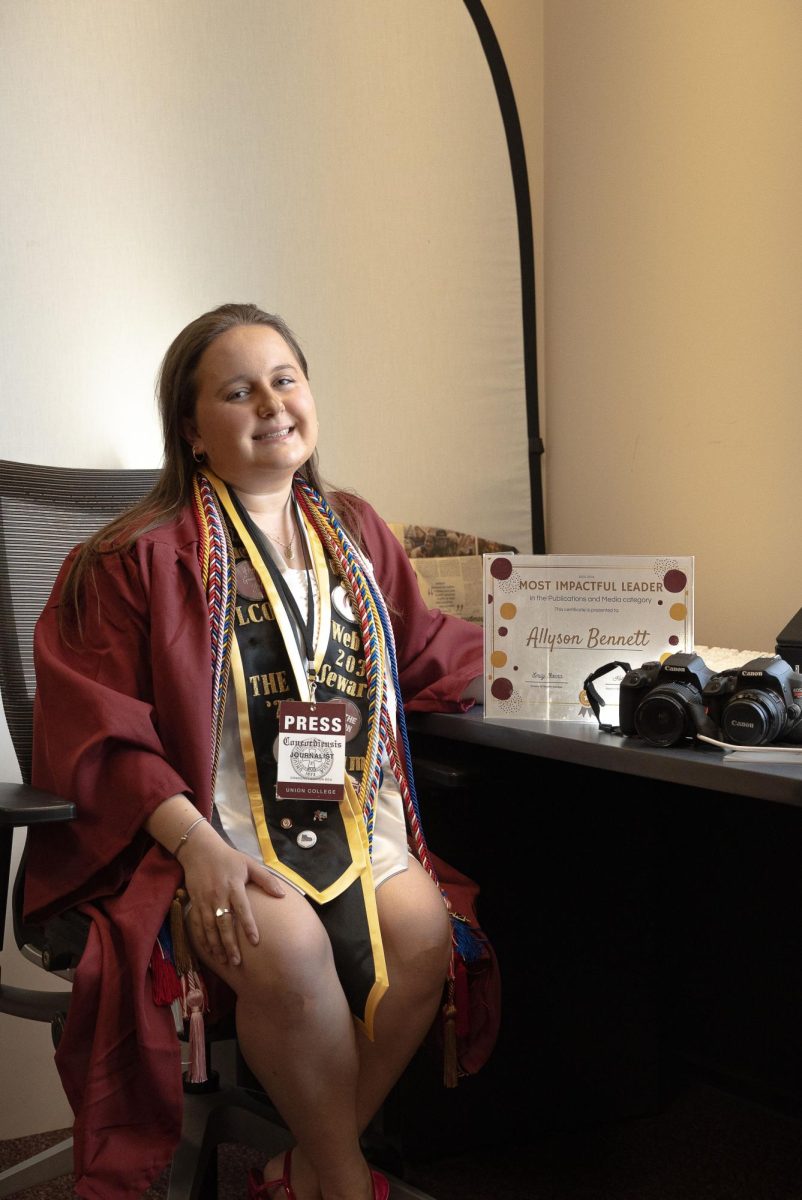 Digital Media Editor Emeritus Allyson Bennett '26 sits in the Concordiensis office. 